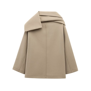 Detail of camel wool coat featuring integrated scarf design and minimalist stitching
