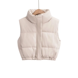 Women's chic beige faux leather puffer vest with a stand collar and quilted design