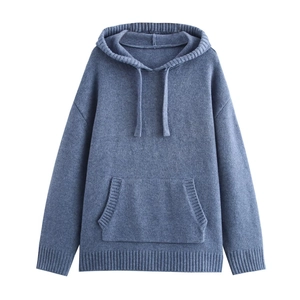 Detail of grey-blue knitted hoodie showing fine fabric texture, drawstring hood and pocket