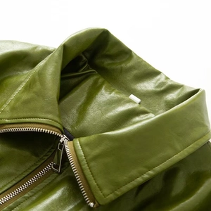 Olive green faux leather jacket with lapel collar and silver metal zipper detail