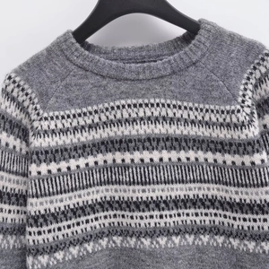 Classic Fair Isle knit sweater for women with grey geometric patterns and round neckline