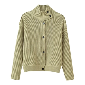 Detail of light olive green ribbed knit cardigan with black buttons and funnel neck collar