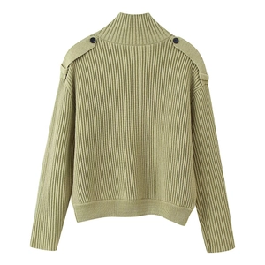 Detail of sage green ribbed knit sweater back with high collar and shoulder button accents