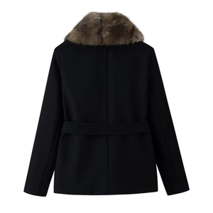 Rear view of black wool coat featuring thick brown faux fur collar and matching waist belt