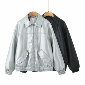 Detail of elastic hem and cuffs on metallic silver and black PU leather jackets