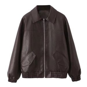 Detail view of dark brown PU leather jacket with classic collar and elastic hem