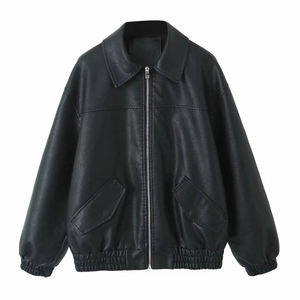 Detail of classic black PU leather jacket featuring lapel collar and elastic hem design