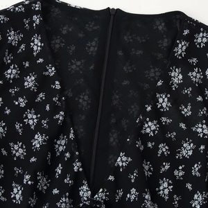 Slim fit black floral dress with V-neckline and invisible back zipper closure