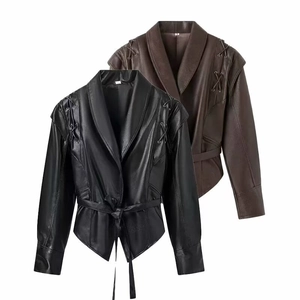 Detail view of the sleek PU leather texture on black and brown retro motorcycle jackets
