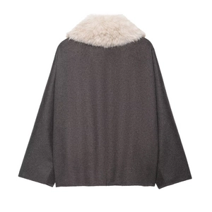 Fashionable dark grey wool jacket with a thick cream faux fur collar in a loose fit