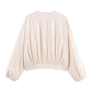 Giacca beige chic a maniche lunghe con ricamo floreale e orlo elasticizzato donna
