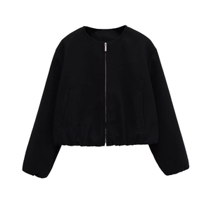 Flat lay of a black short jacket with silver zipper closure and a clean crew neck design