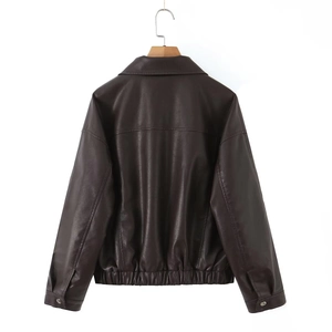 Detail of dark brown PU jacket back showing elastic hem and vintage stitching
