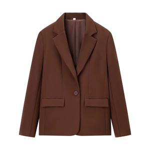 Detail shot of notched lapel and single-button closure on a dark brown suit blazer