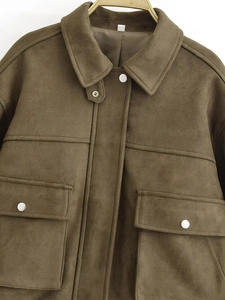 Detailed view of brown faux suede bomber jacket with turn-down collar and snap pockets