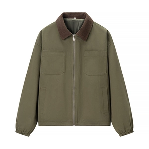 Detail of olive green jacket with brown corduroy collar and metallic zipper hardware