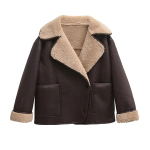 Fashionable dark brown faux leather jacket with plush cream faux fur lining and wide lapels