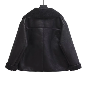 Back view of a black faux shearling jacket with large collar and fuzzy cuffs