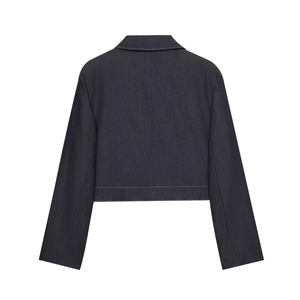 Detailed back view of a navy blue cropped jacket with professional contrast stitching