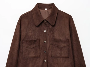 Detailed view of dark brown suede jacket with metal snaps and front flap pockets
