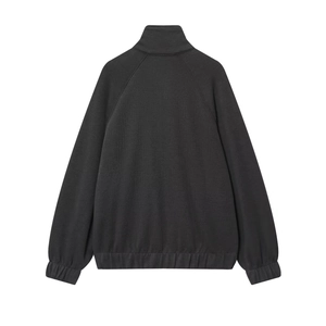 Back view of minimalist dark grey zip-up jacket featuring raglan sleeves and ribbed cuffs