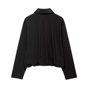 Back view of a black velvet bomber jacket with a pleated hem and classic collar
