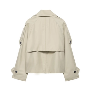 Back view of short khaki trench coat featuring classic storm flap and shoulder epaulettes
