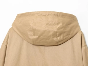 Detail of khaki hooded jacket showing back view seam construction and high-density fabric