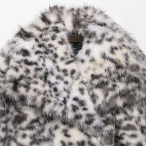 Chic leopard print faux fur jacket with wide lapels in black and white winter style