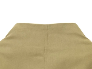 Macro shot of khaki twill fabric detail with professional double-needle stitching quality