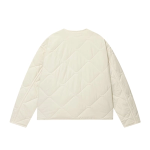 Rear view of off-white quilted jacket featuring classic diamond stitching and ribbed trim
