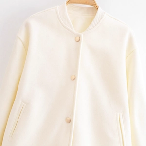 Minimalist beige wool bomber jacket with gold snap buttons and stand collar for women