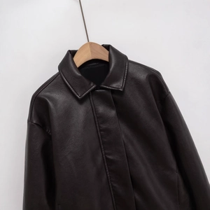 Chic oversized brown faux leather jacket with hidden placket and lapel for street style