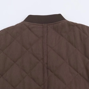 Deep brown quilted bomber jacket with diamond pattern and ribbed knit collar detail