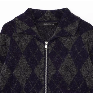 Navy blue and grey diamond knit bomber jacket featuring a lapel collar and silver zipper