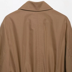 Women's autumn khaki parka jacket featuring twill fabric texture and reinforced stitching