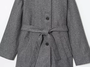Detail of heather grey wool coat featuring resin buttons and tied waist belt buckle