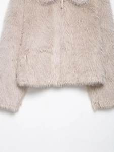 Detailed macro view of high-quality faux fur material with zipper and lapel texture