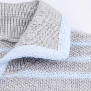 Close-up of a striped sleeveless knit vest with a grey ribbed lapel and soft texture
