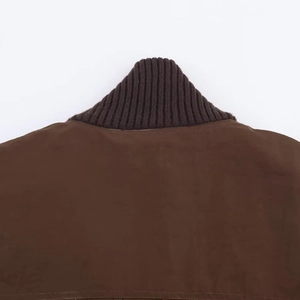 Deep brown loose rib-knit long sleeve jacket with high-quality textured collar detail
