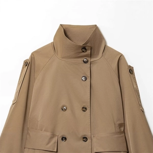 Elegant khaki double-breasted trench coat with high collar and shoulder epaulettes