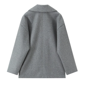 Rear view of dark grey wool blend coat showing lapel collar and minimalist seam detail