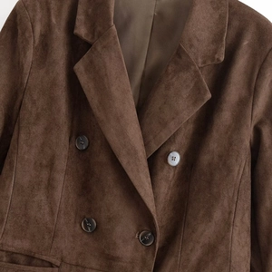 Classic olive green double-breasted suit blazer with suede texture and notch lapels