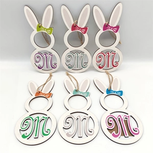 Set of 6 wooden Easter bunny hanging ornaments with colorful bowties and hollow M design