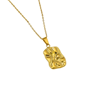 Gold-plated stainless steel necklace featuring a rectangle textured lava pendant on white background