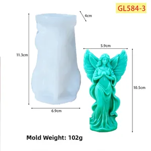 Detail view of angel silicone mold with finished plaster statue showing dimensions