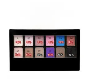 Macro shot of 12-color nude palette featuring shimmer and matte burgundy eyeshadow tones