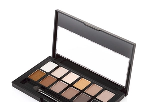Detailed close-up of 12-color nude eyeshadow palette with matte and shimmer shades