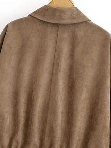Detail view showing the premium brown suede texture and back seam of the women's jacket