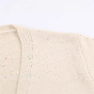 Chic cream rainbow nep knit sweater featuring textured rib neckline and dropped shoulders
